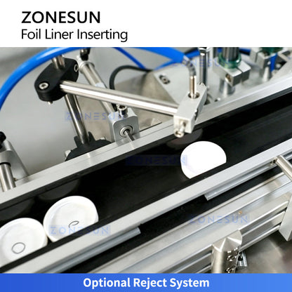 Cap wadding machine with reject system